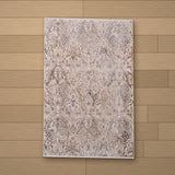 Bursa rug laid flat on a wooden floor