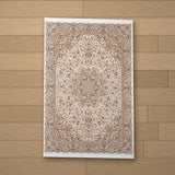 Denizli rug laid flat on a wooden floor