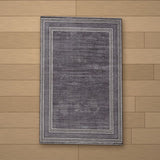 Ayvalik rug laid flat on a wooden floor