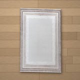 Beylerbeyi rug laid flat on a wooden floor