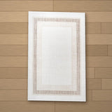 Birecik rug laid flat on a wooden floor