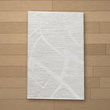 Dara rug laid flat on a wooden floor