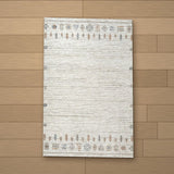 Datca rug laid flat on a wooden floor