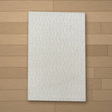 Harran rug laid flat on a wooden floor
