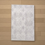 Laodikya rug laid flat on a wooden floor