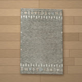 Mersin rug laid flat on a wooden floor