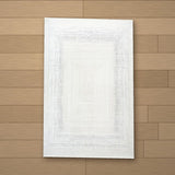 Nizip rug laid flat on a wooden floor