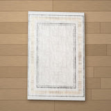 Oguzeli rug laid flat on a wooden floor