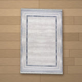 Tarsus rug laid flat on a wooden floor